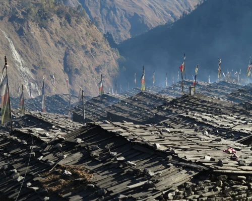 Wooden Hut Of Tamang With Buddhist Flag